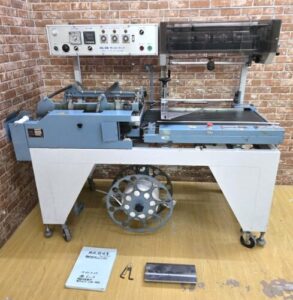 インターナショナル三興 サンコーL型全自包装機 ASL-250 三相200V 自動L型3方シーラー シュリンク包装機を買い取りました♪